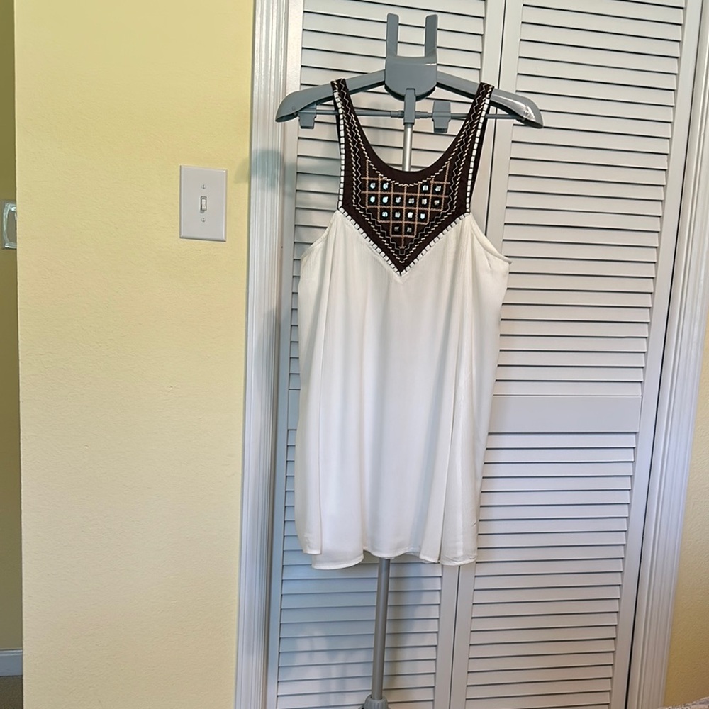 White Sleeveless Top with Brown Embellished Neckline